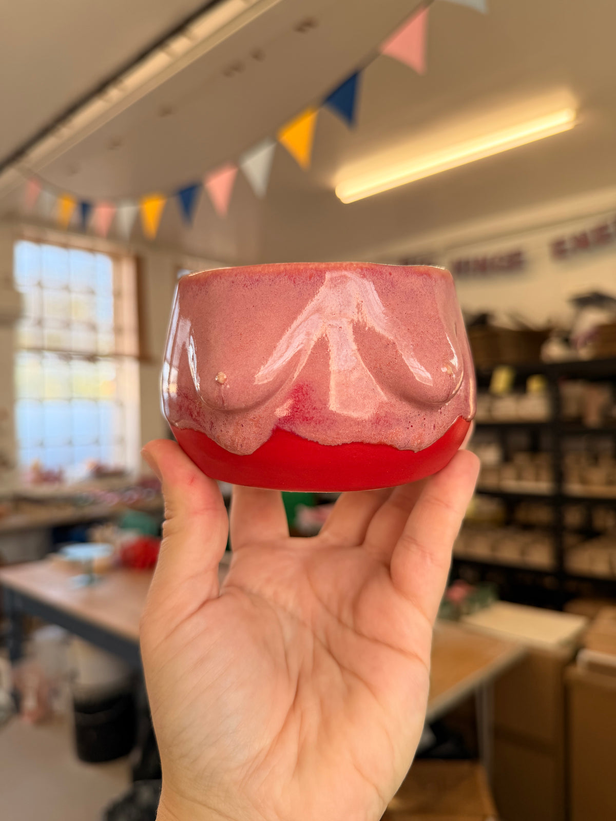 Wheel thrown pink and red boob pot