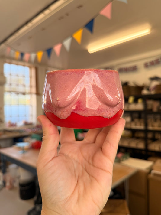 Wheel thrown pink and red boob pot